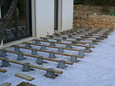 Pose sur plots en béton